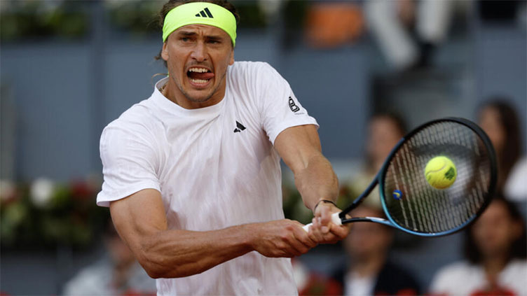 Zverev crashes as Swiatek scrapes into Madrid Open quarter-finals